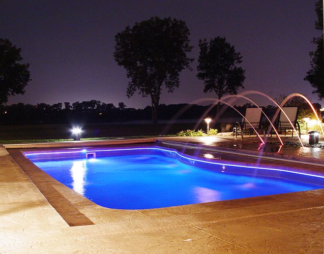 Add fire features to your swimming pool area