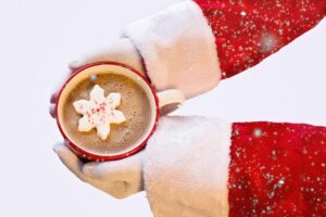 santa hands and cup of cocoa